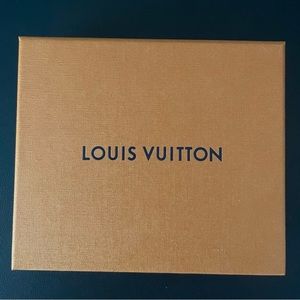 Genuine, never used.Louis Vuitton Mens Multiple wallet Graphite color.